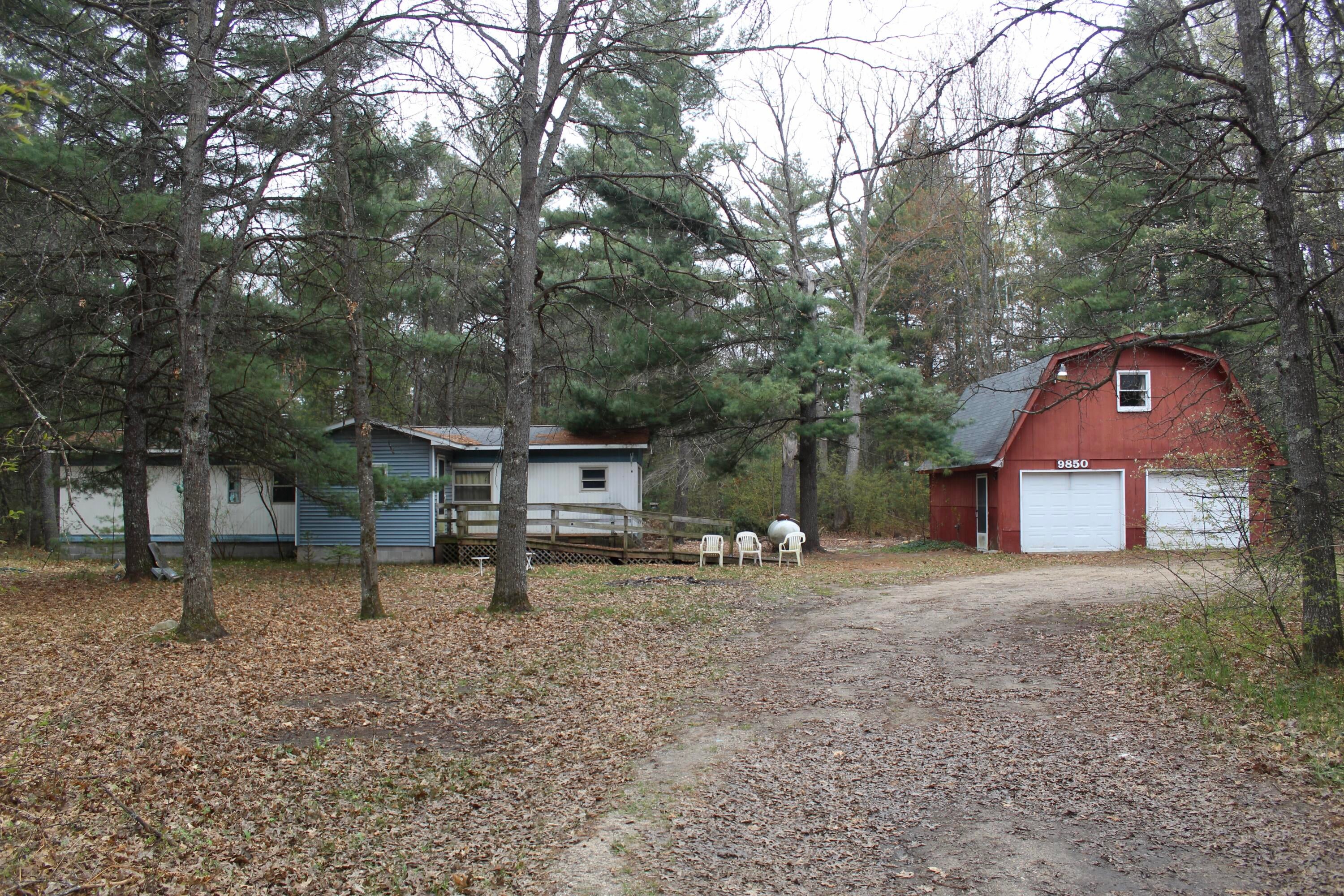 9850 South Grayling Road Roscommon, MI 48653 - Photo 1 of 16 IMG_6703