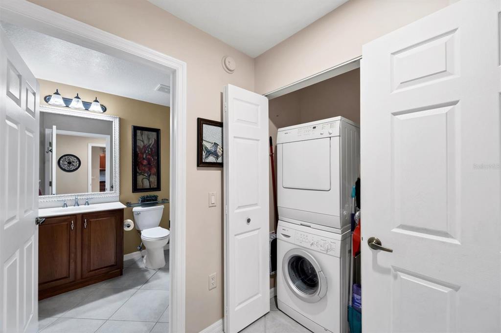 13113 Gasparilla Road, Unit 403 Placida, FL 33946 - Photo 33 of 62 a view of a hallway with washer and dryer