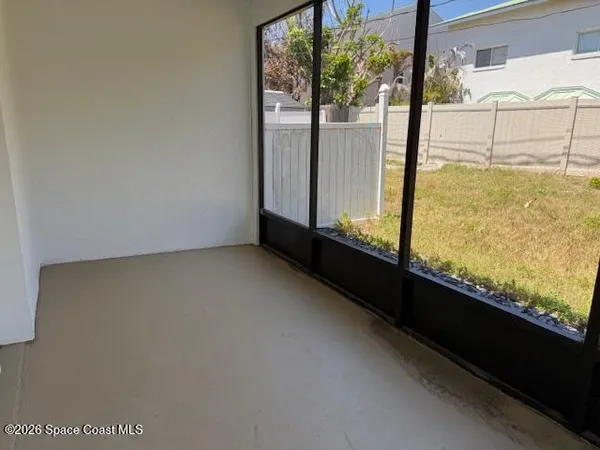 a view of a room with racks on the wall