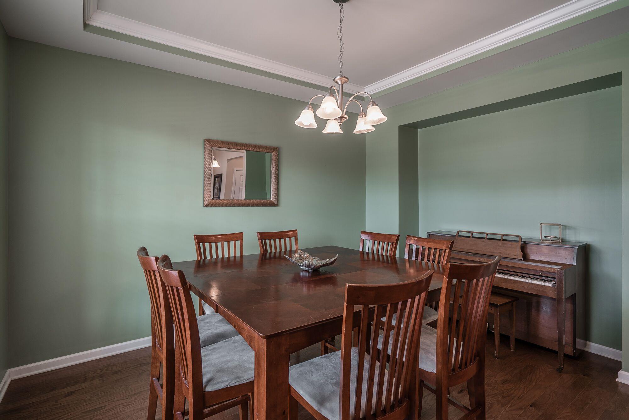 1044 Merrick Road Hendersonville, TN 37075 - Photo 12 of 27 a view of a dining room with a table and chairs