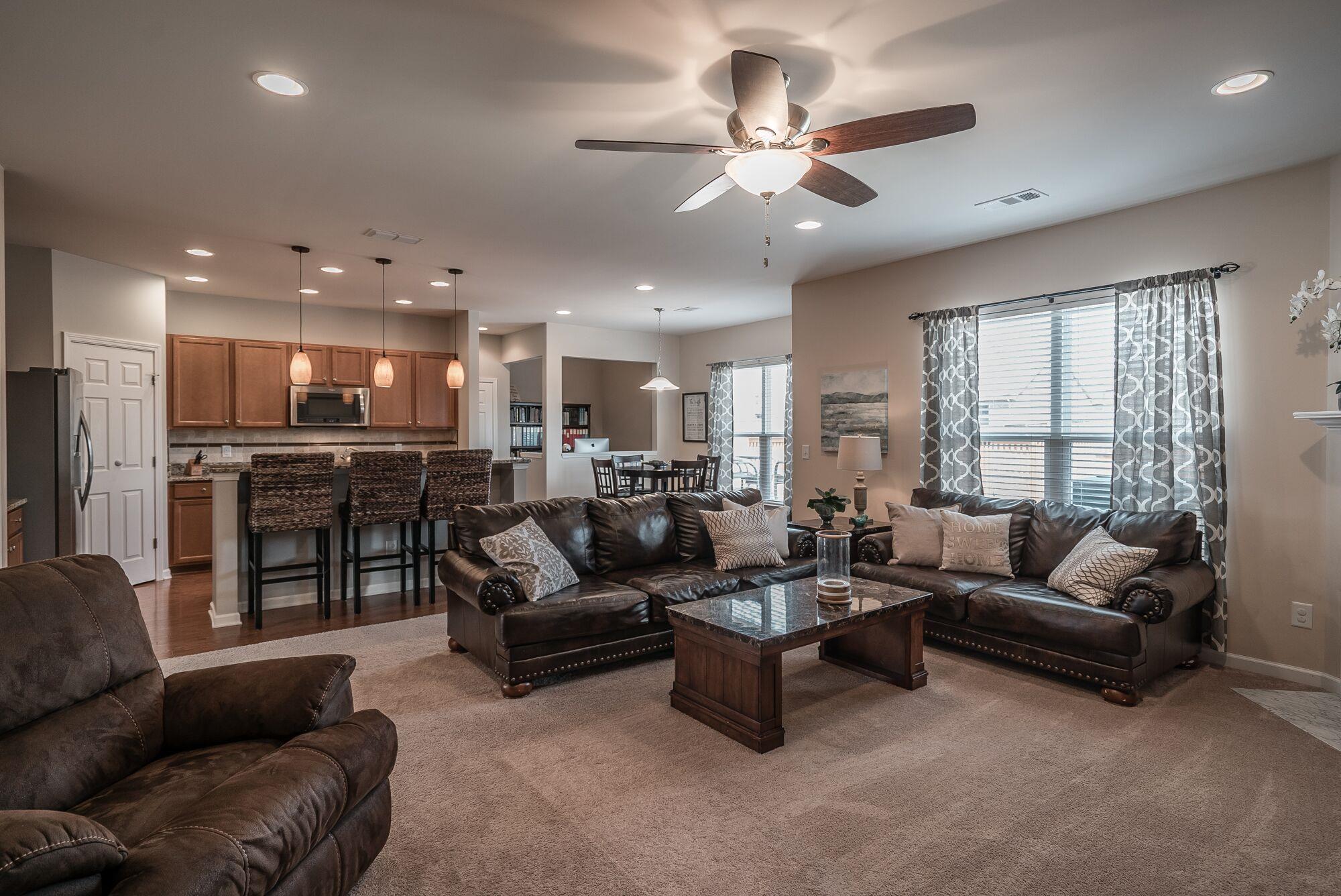 1044 Merrick Road Hendersonville, TN 37075 - Photo 3 of 27 a living room with furniture kitchen area and a large window