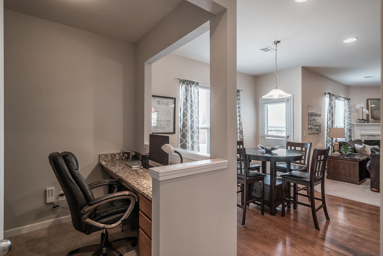 1044 Merrick Road Hendersonville, TN 37075 - Photo 8 of 27 a view of a dining room with furniture and wooden floor