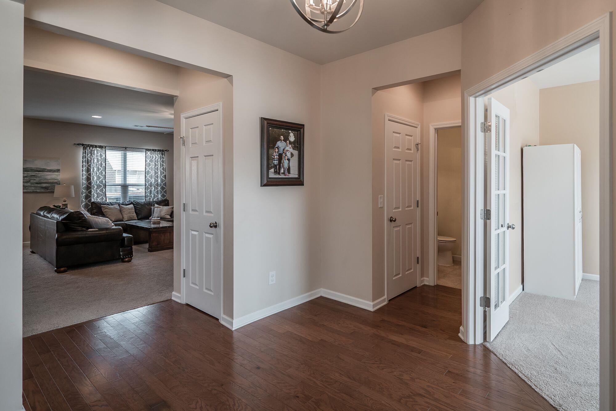1044 Merrick Road Hendersonville, TN 37075 - Photo 10 of 27 a view of a livingroom with furniture and hardwood floor