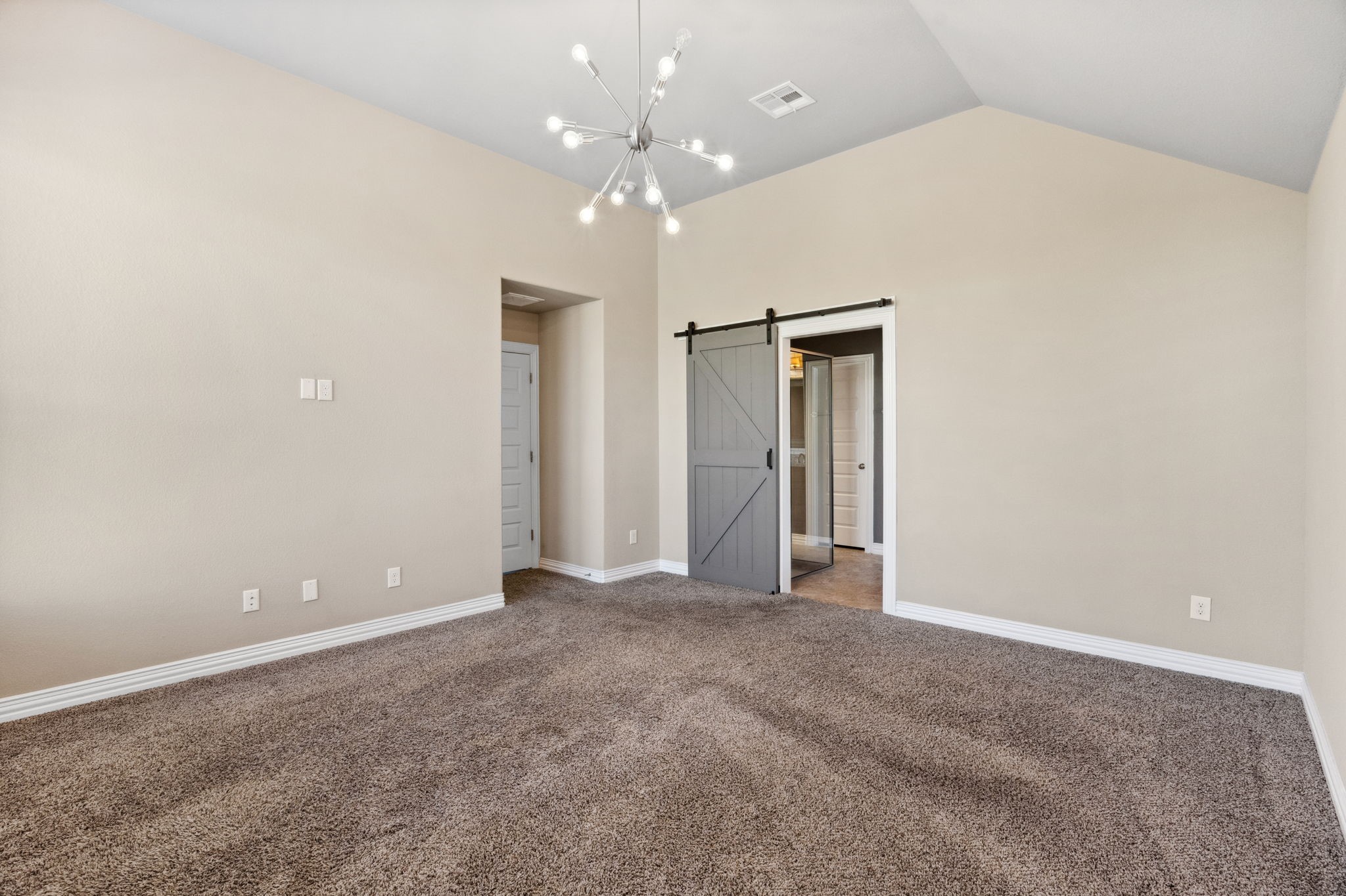 3929 Goodnight Trail Leander, TX 78641 - Photo 12 of 29 an empty room with chandelier fan and closet area