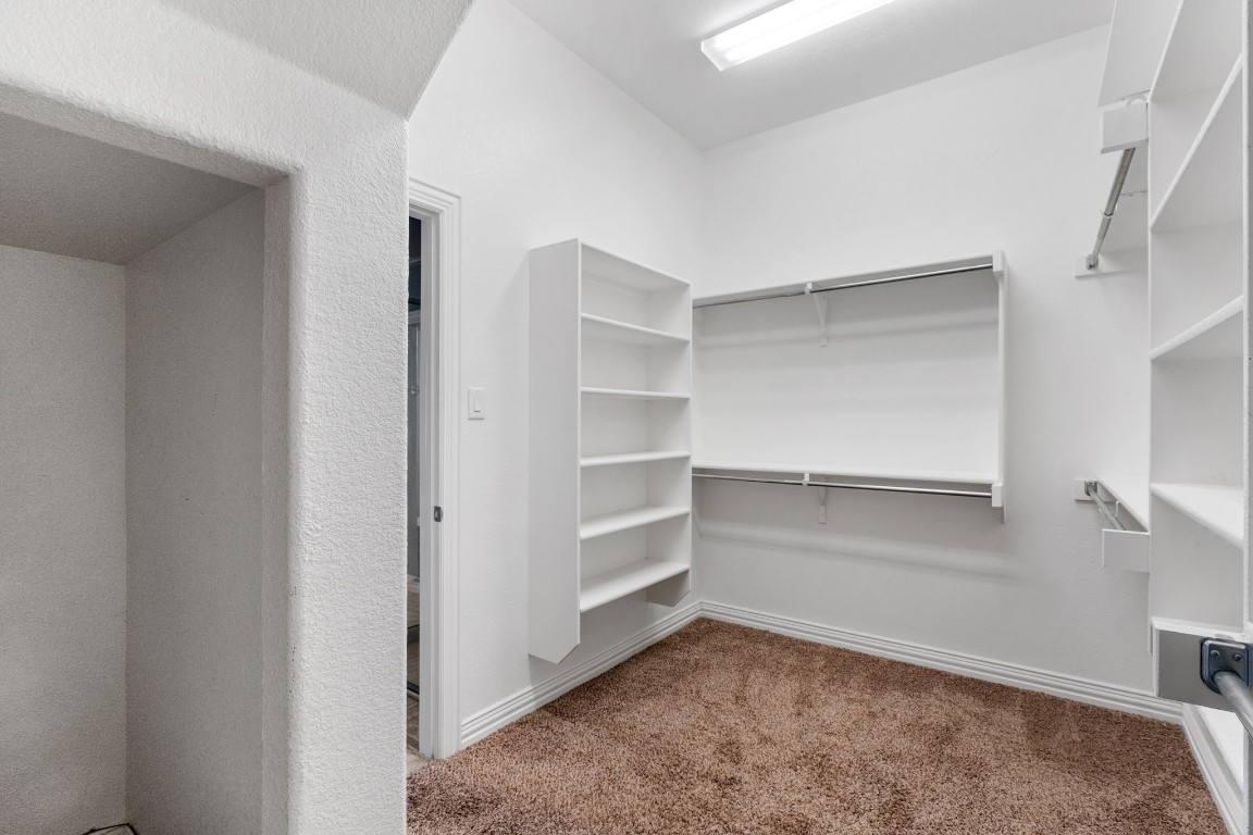 3929 Goodnight Trail Leander, TX 78641 - Photo 16 of 29 a view of an empty walk in closet