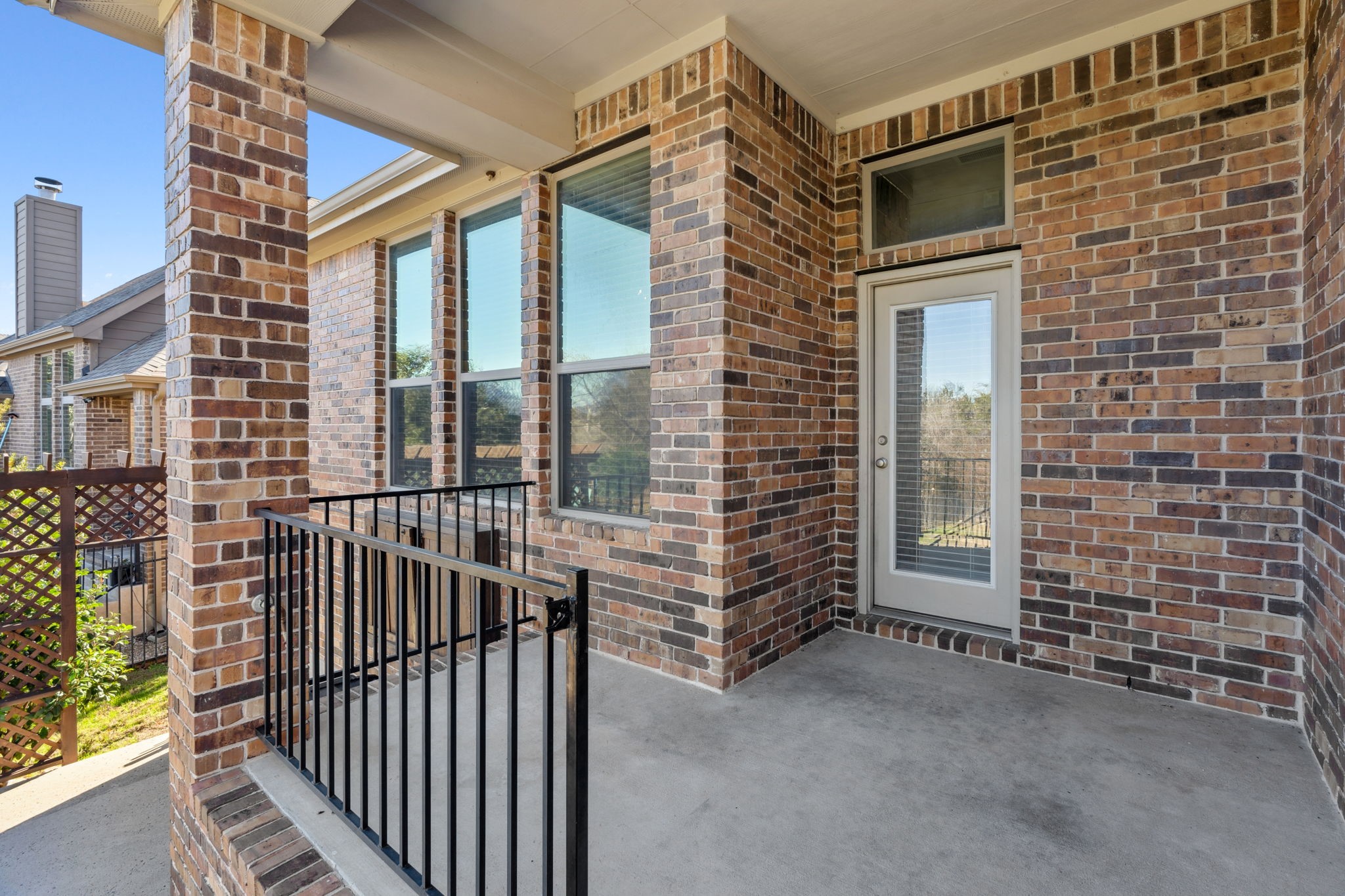3929 Goodnight Trail Leander, TX 78641 - Photo 28 of 29 a view of a brick wall from a backyard