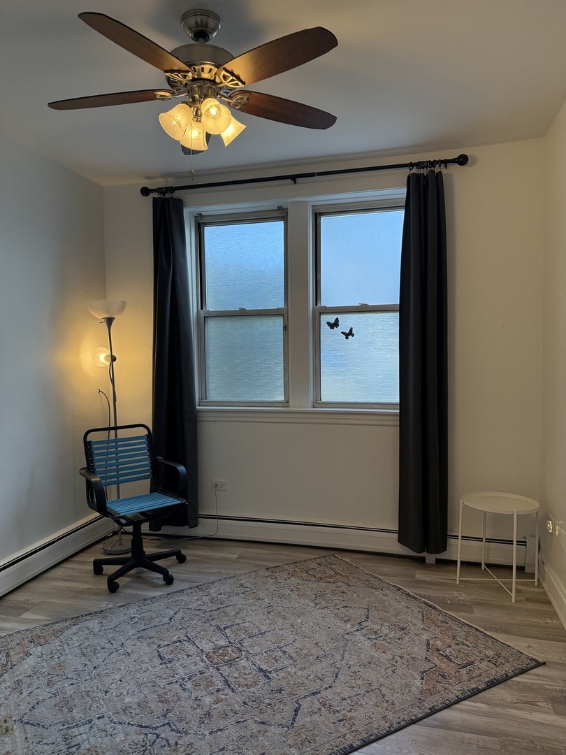 6000 West Seminole Street, Unit GDN Chicago, IL 60646 - Photo 4 of 7 a view of a workspace with furniture and a window