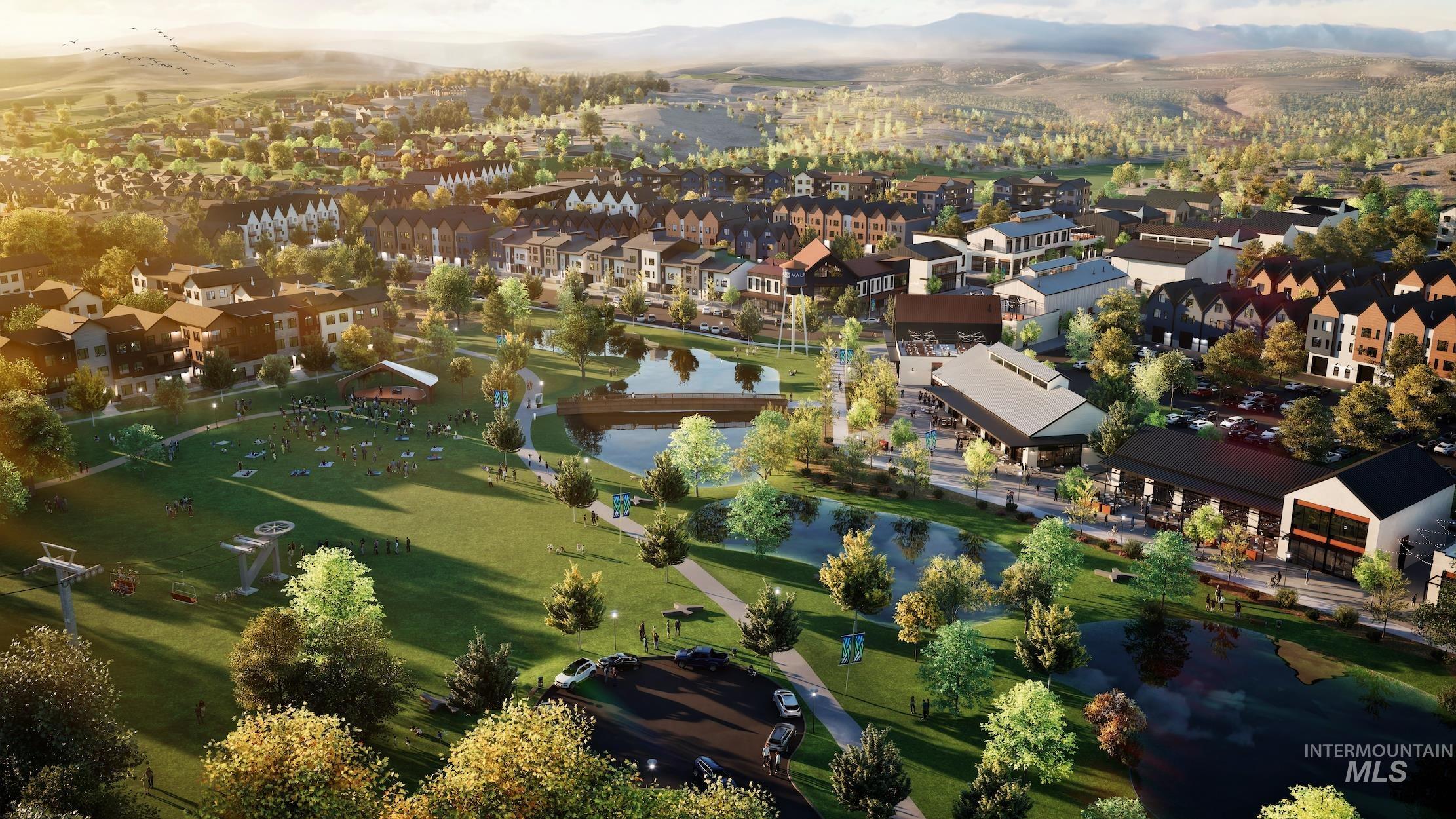6370 North Barholm Lane Eagle, ID 83616 - Photo 33 of 33 Aerial perspective of suburban area featuring a water and mountain view