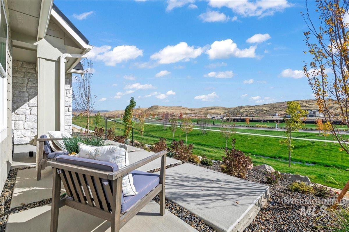 6370 North Barholm Lane Eagle, ID 83616 - Photo 4 of 33 View of patio / terrace featuring a mountain view