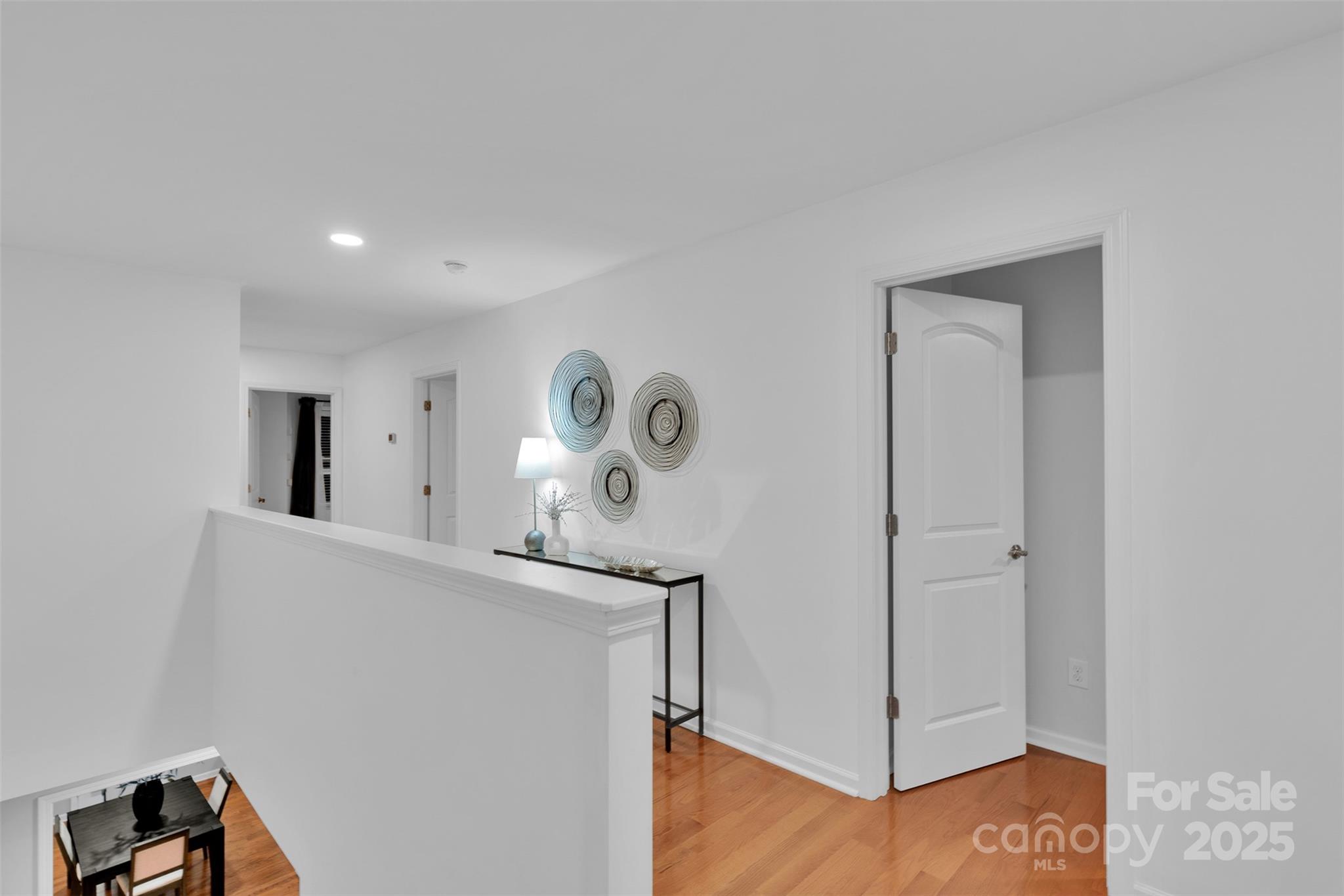 226 Bubbling Well Road Matthews, NC 28105 - Photo 23 of 47 a view of a hallway with entryway