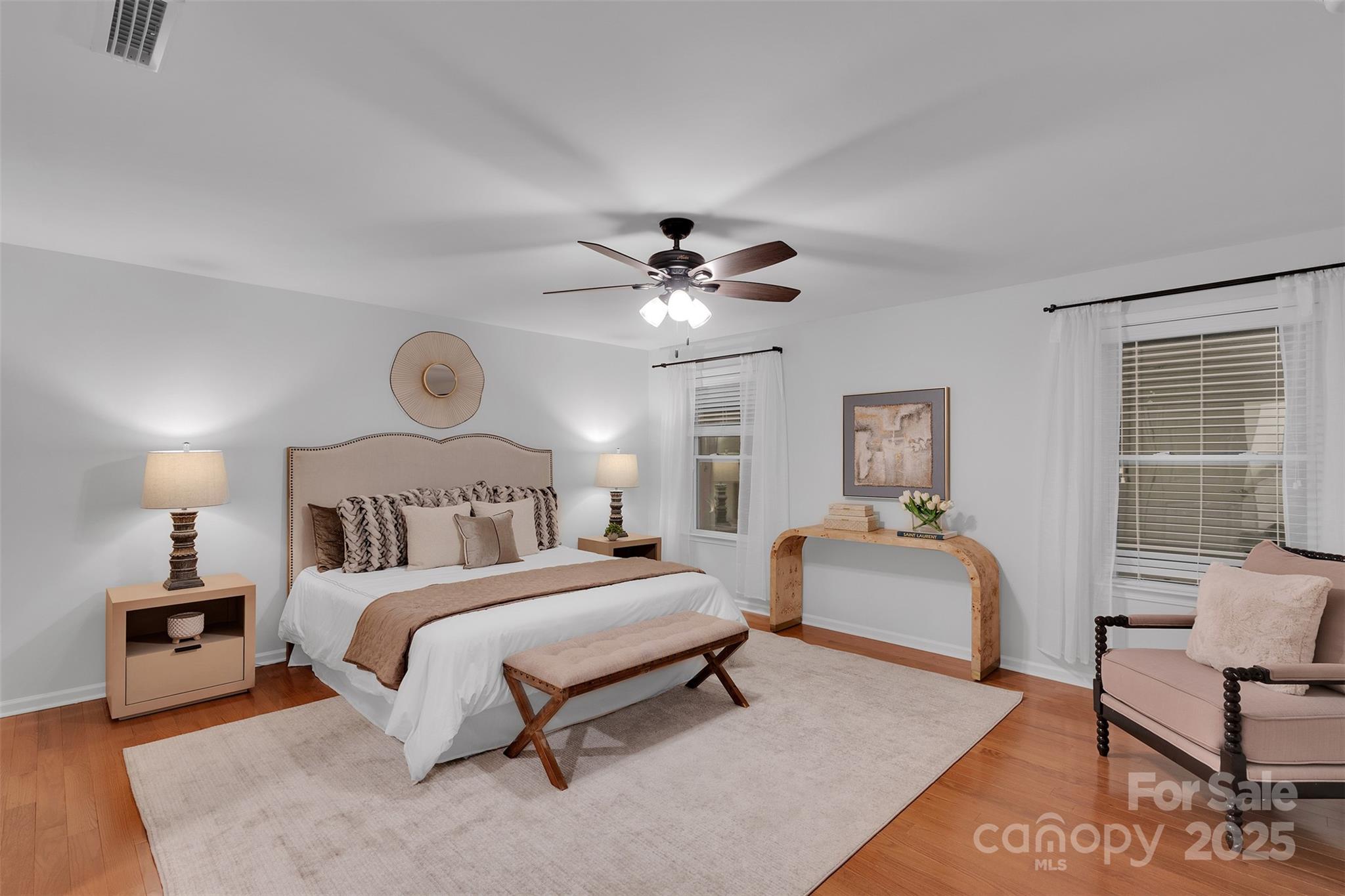 226 Bubbling Well Road Matthews, NC 28105 - Photo 29 of 47 a bedroom with a bed and a couch