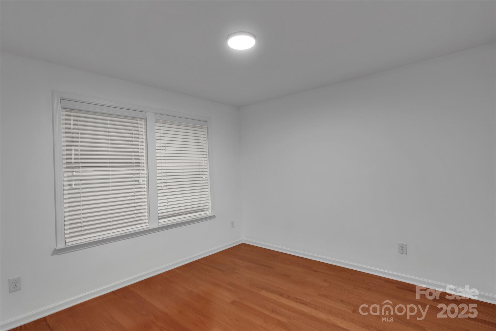 226 Bubbling Well Road Matthews, NC 28105 - Photo 41 of 47 an empty room with a window