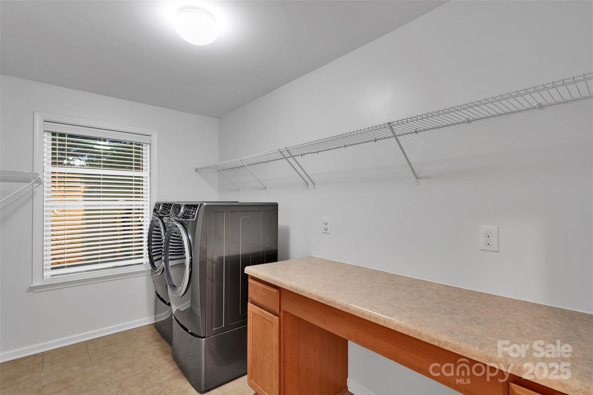 226 Bubbling Well Road Matthews, NC 28105 - Photo 43 of 47 a utility room with dryer and washer