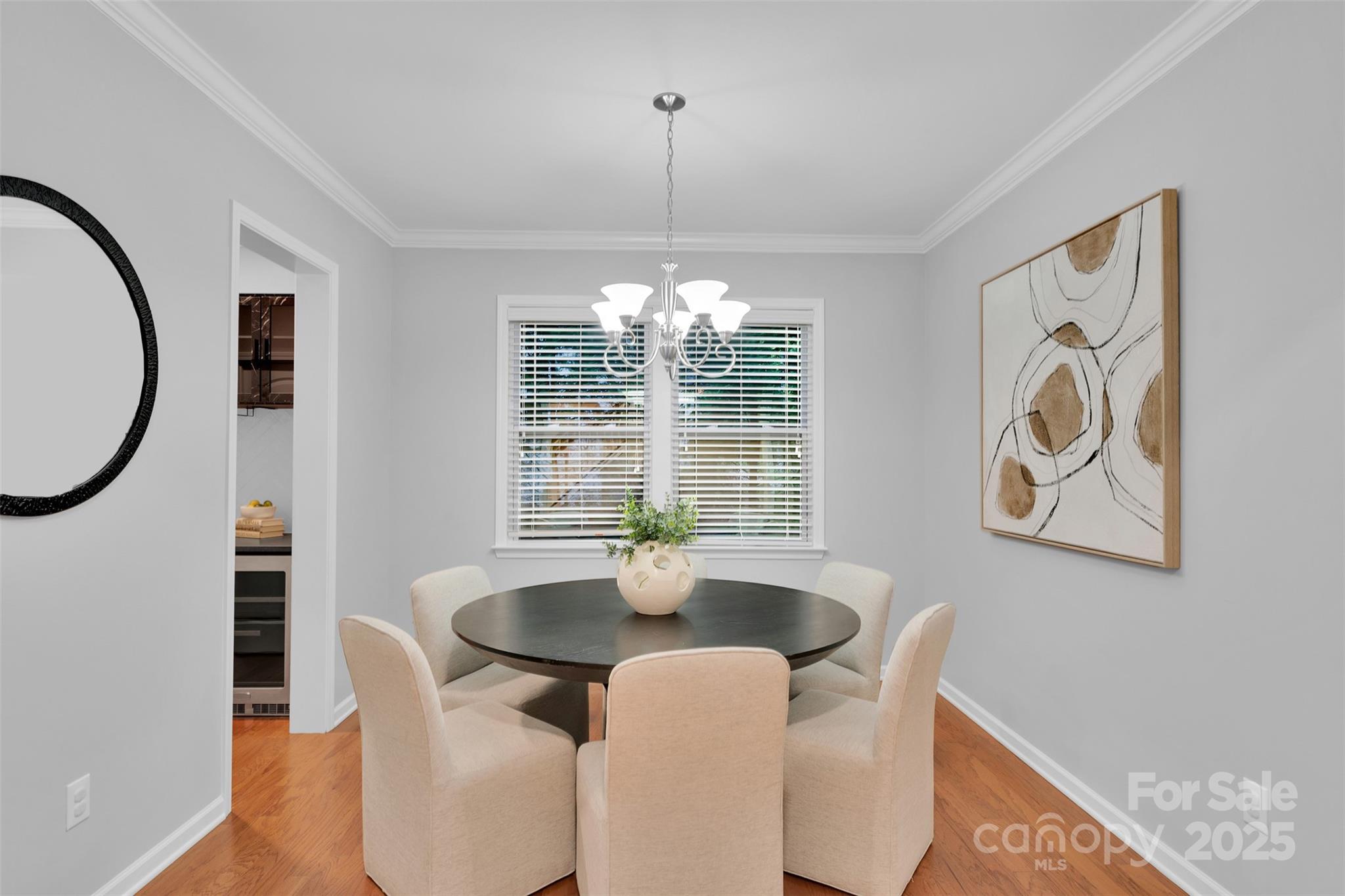 226 Bubbling Well Road Matthews, NC 28105 - Photo 9 of 47 a dining room with furniture and window