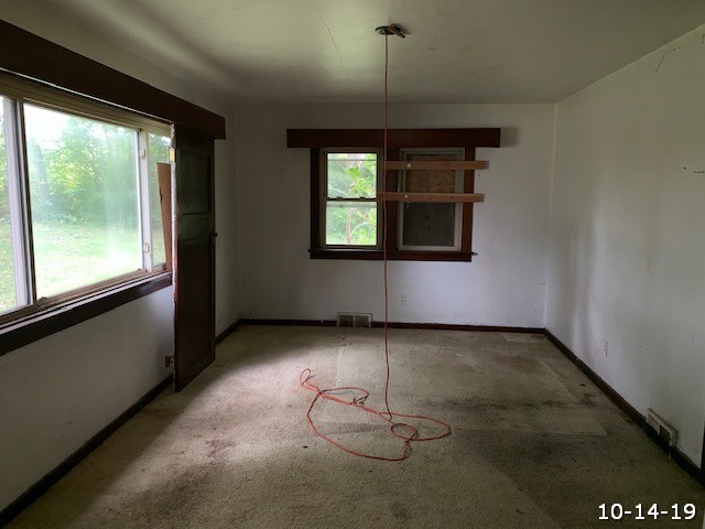 4701 McCullom Lake Road McHenry, IL 60050 - Photo 6 of 7 a view of an empty room with windows