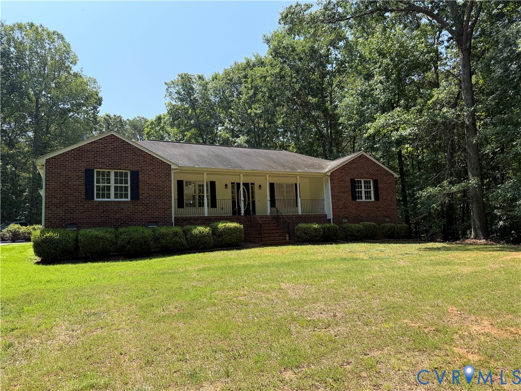 3539 Timberview Road Powhatan, VA 23139 - Photo 1 of 2 Brick ranch-style residence featuring a covered fr
