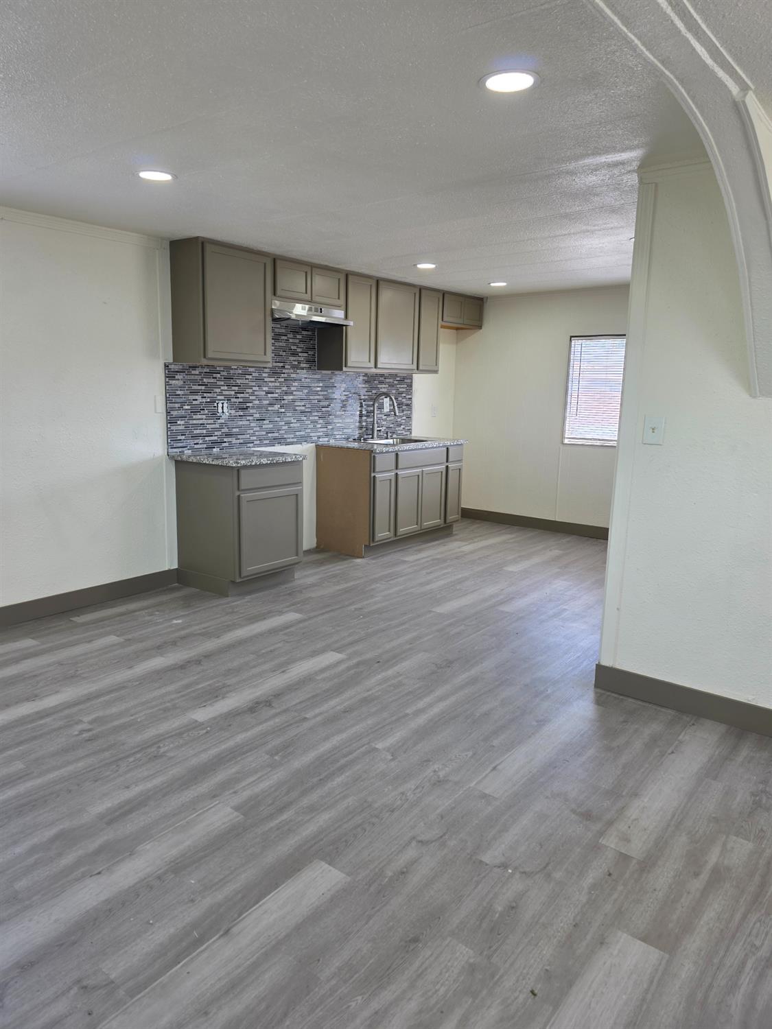 5200 Crest Road Atwater, CA 95301 - Photo 6 of 19 a large kitchen with a refrigerator and a sink