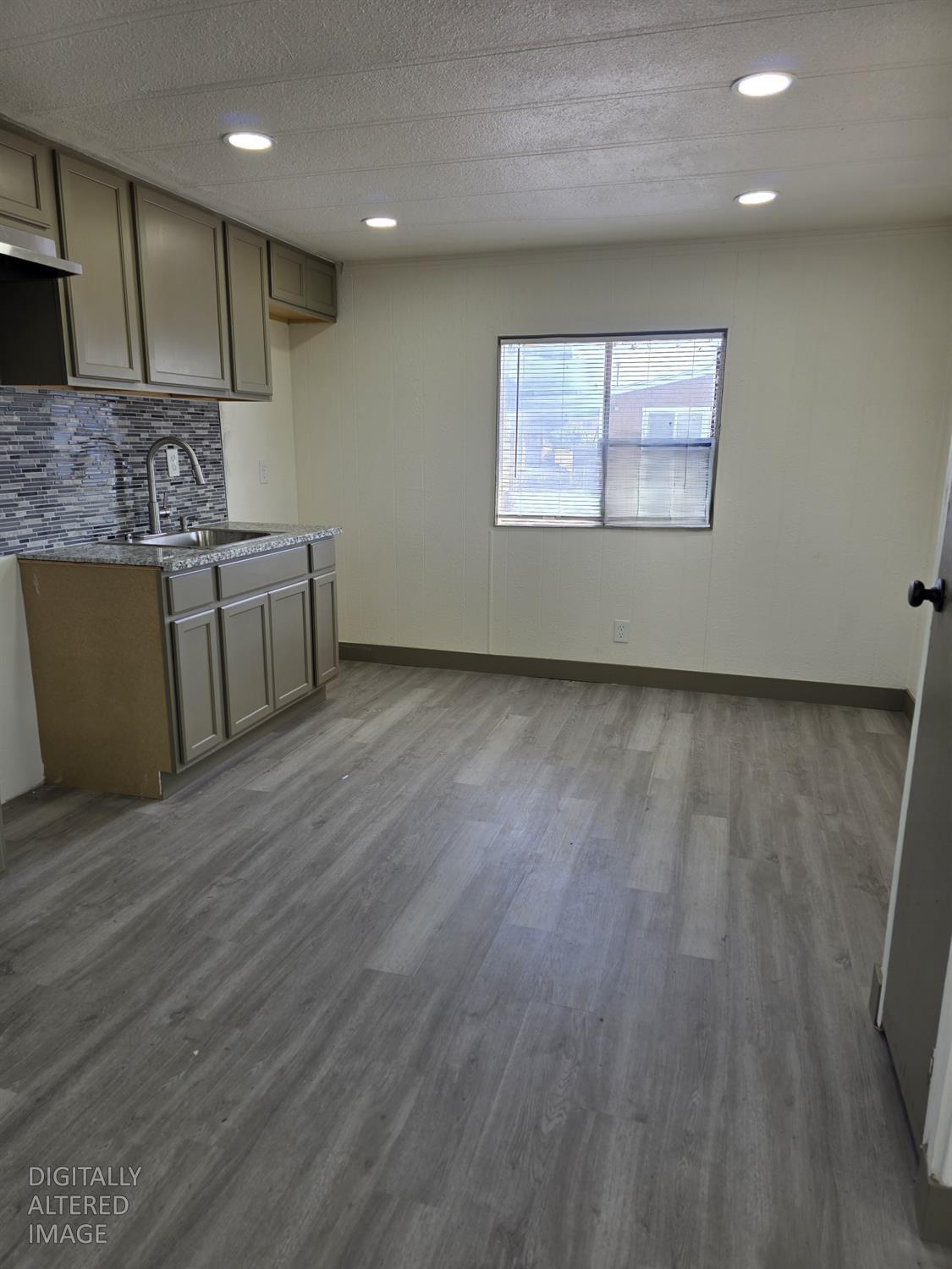 5200 Crest Road Atwater, CA 95301 - Photo 7 of 19 a view of kitchen with wooden floor and electronic appliances