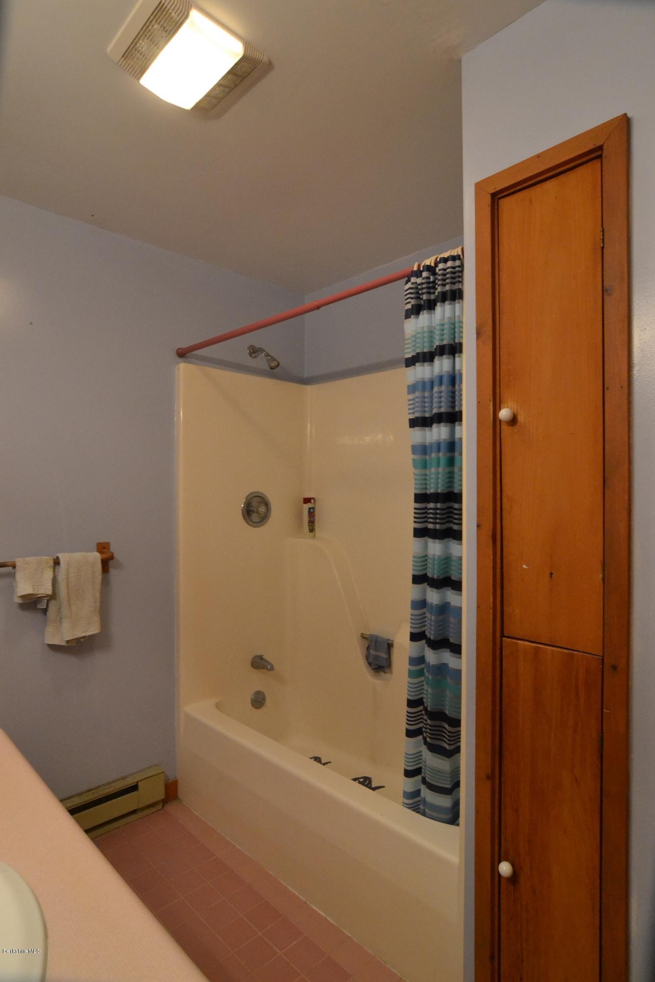 3008 Jacobs Ladder Road Becket, MA 01223 - Photo 14 of 28 a bathroom with bathtub and shower