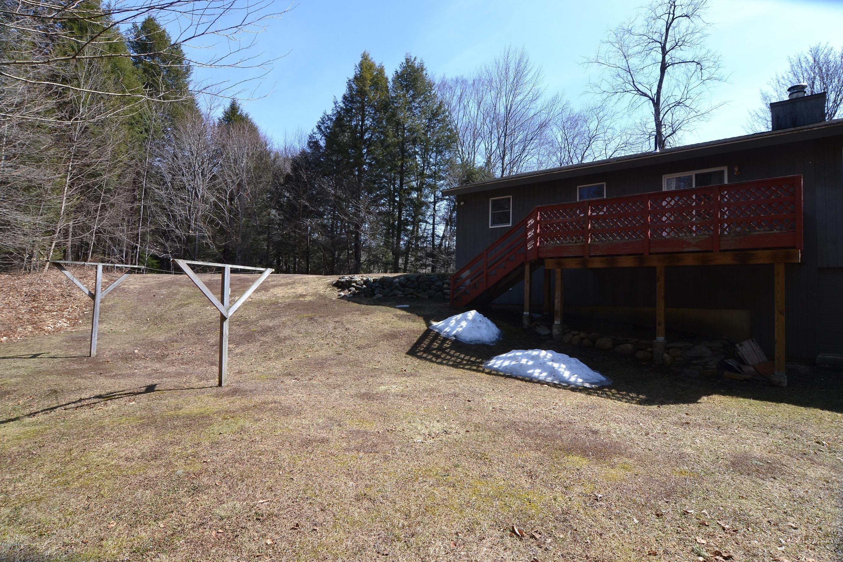 3008 Jacobs Ladder Road Becket, MA 01223 - Photo 26 of 28 a view of backyard with large trees