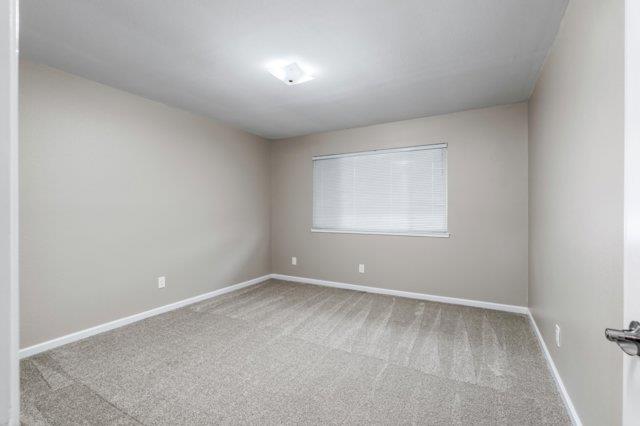 617 West Granger Avenue Modesto, CA 95350 - Photo 14 of 23 an empty room with a window