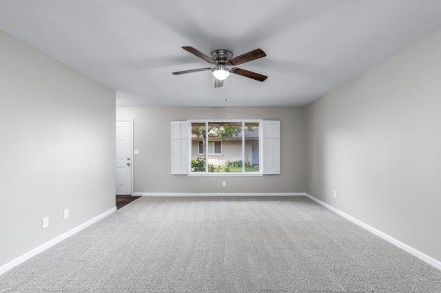 617 West Granger Avenue Modesto, CA 95350 - Photo 4 of 23 a view of room with a ceiling fan and window