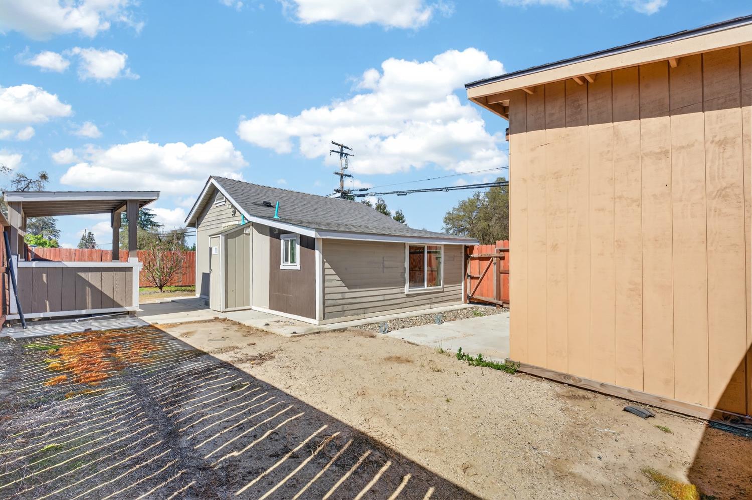 2504 Paradise Road Modesto, CA 95358 - Photo 6 of 14 a front view of a house with a yard