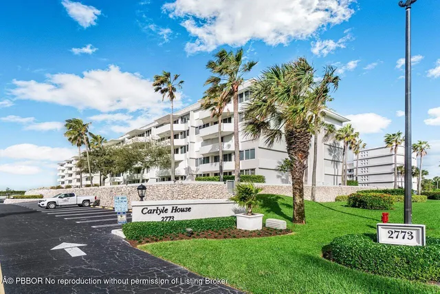 a view of a swimming pool with a lake view