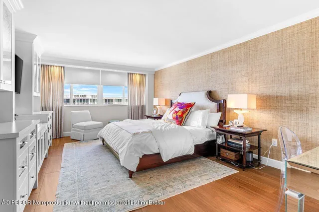 a bathroom with a toilet and shower