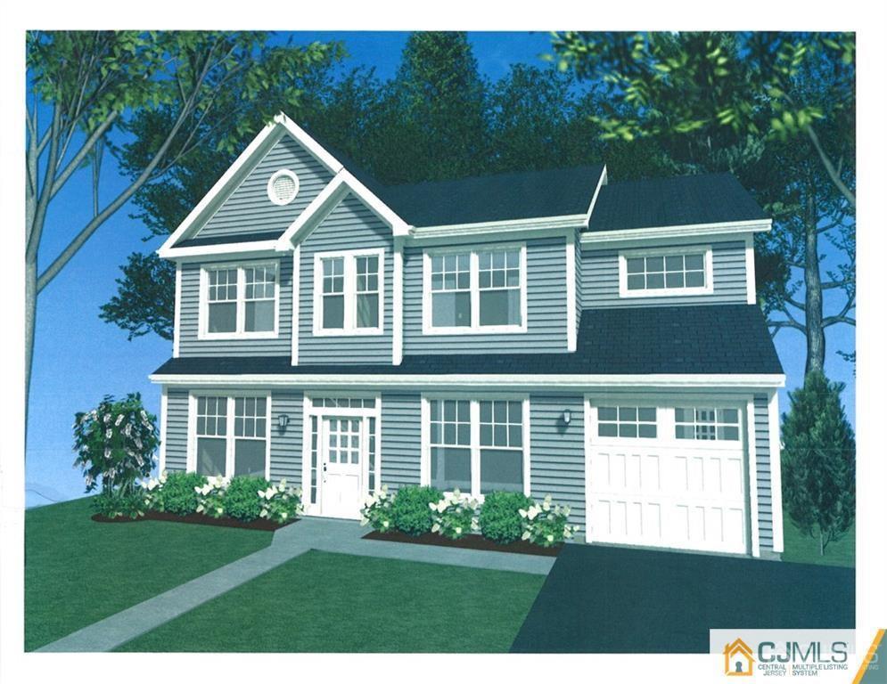 142 Winthrop Road Edison, NJ 08817 - Photo 1 of 1 a front view of a house with a garden
