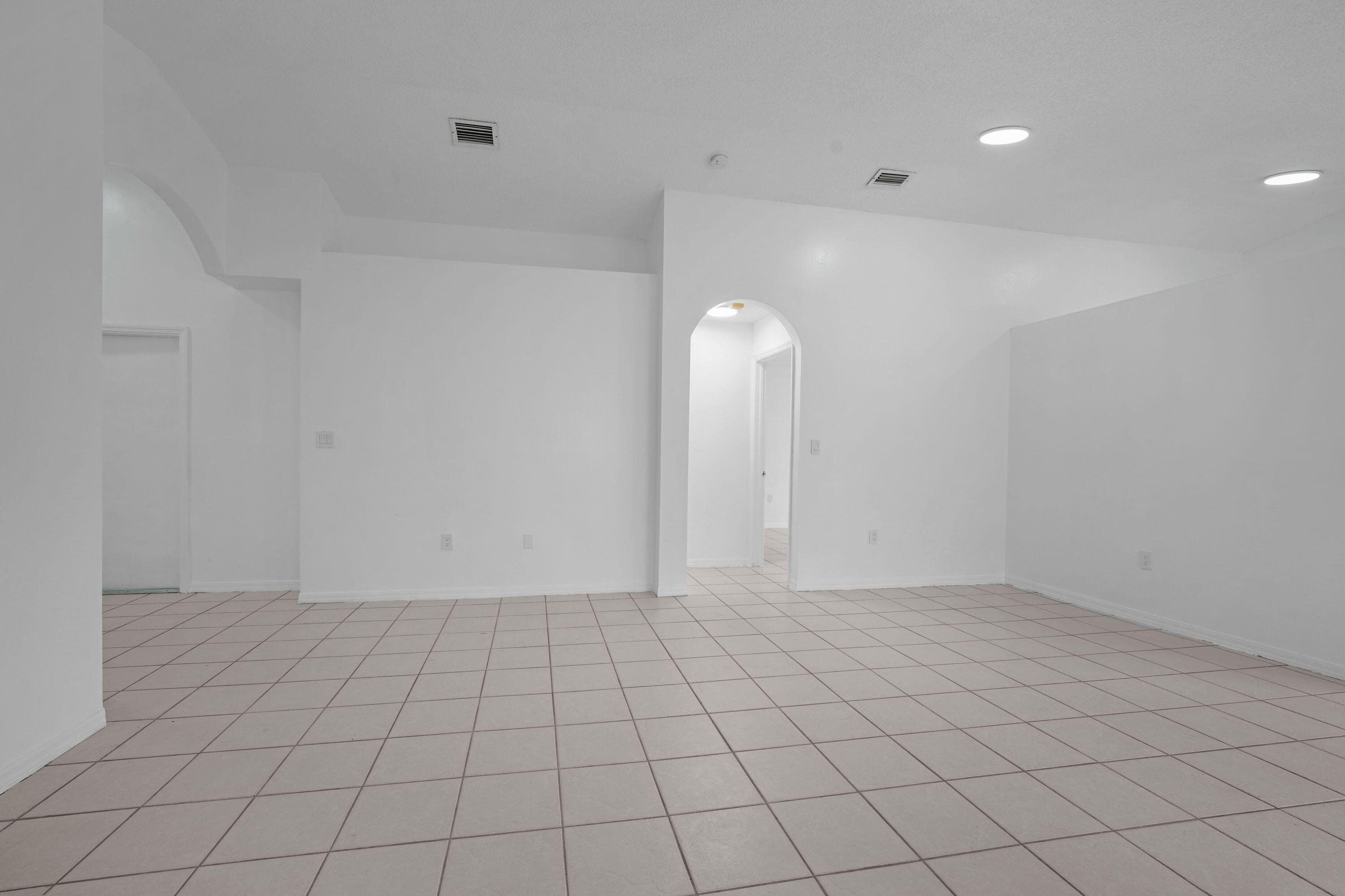 14142 Southwest 149th Court Miami, FL 33196 - Photo 2 of 48 a view of an empty room