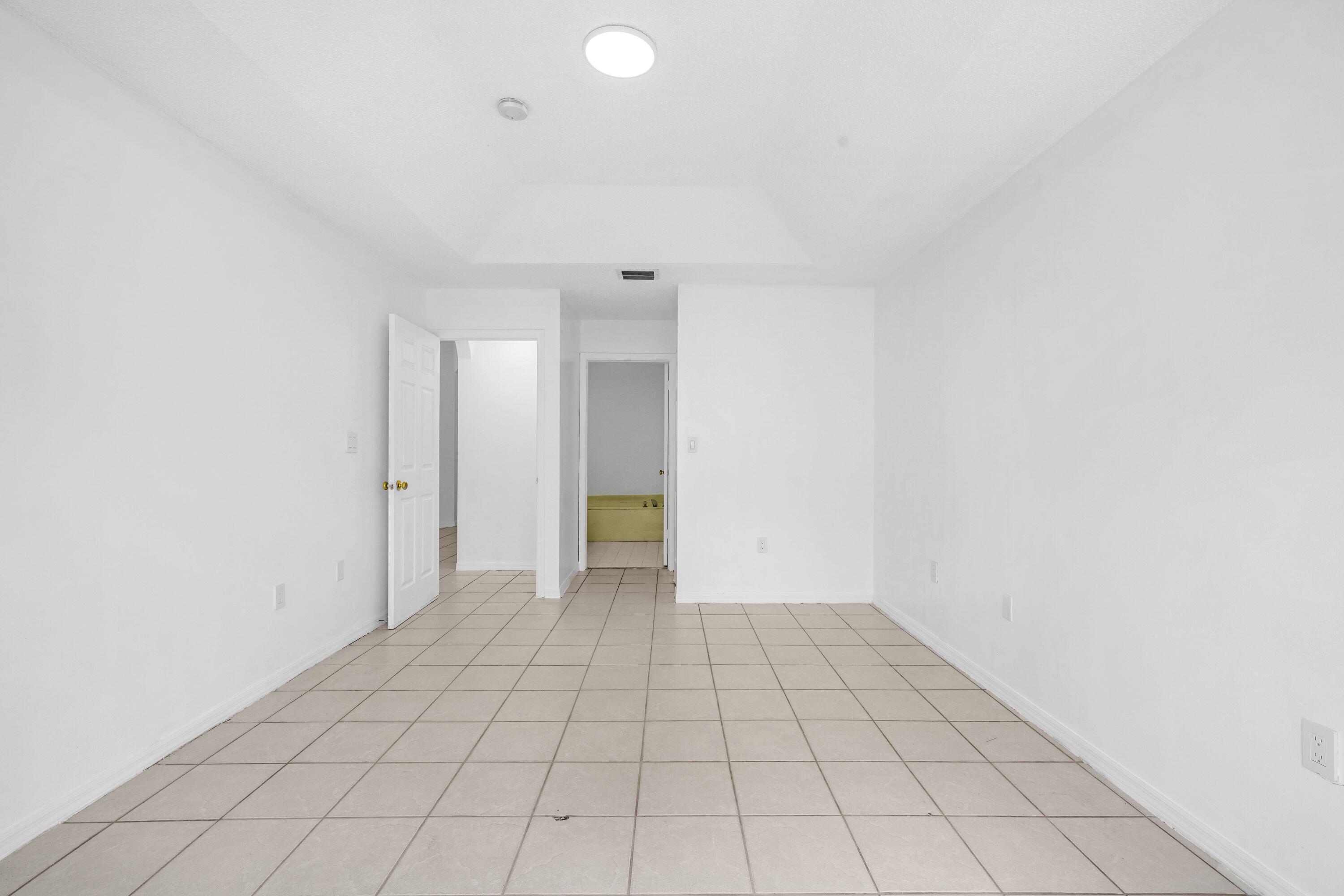 14142 Southwest 149th Court Miami, FL 33196 - Photo 21 of 48 a view of an empty room