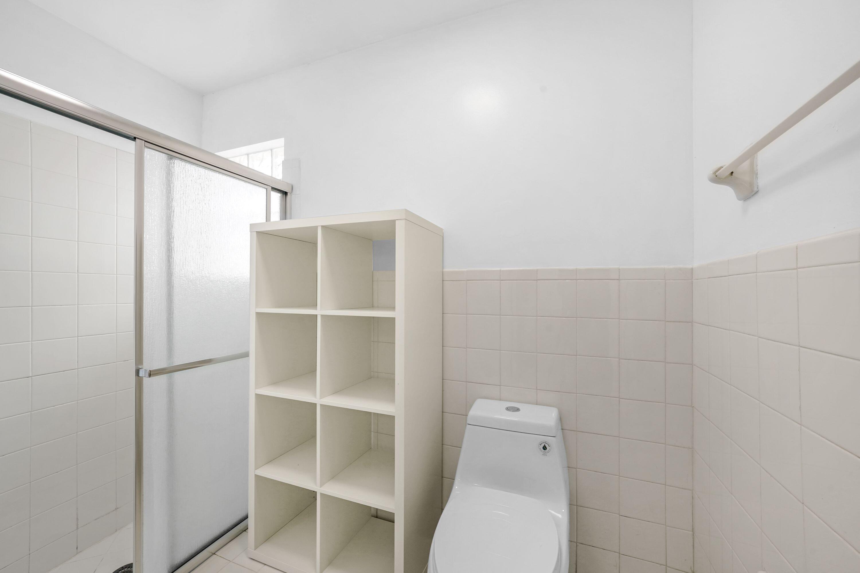 14142 Southwest 149th Court Miami, FL 33196 - Photo 27 of 48 a bathroom with a toilet and a shower