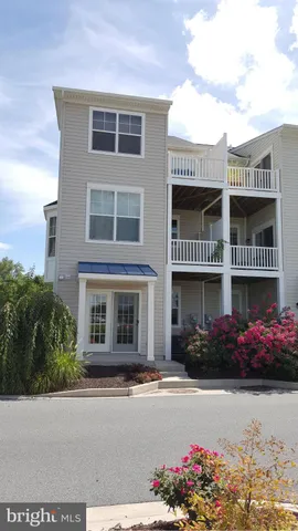 a front view of multi story residential apartment building