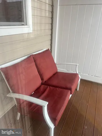 a view of a balcony with chair
