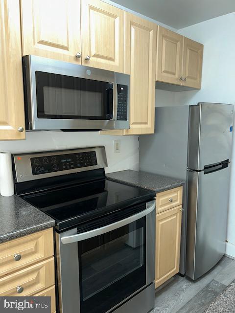 1005 Chillum Road, Unit 110 Hyattsville, MD 20782 - Photo 2 of 8 Modern kitchen with sleek appliances.