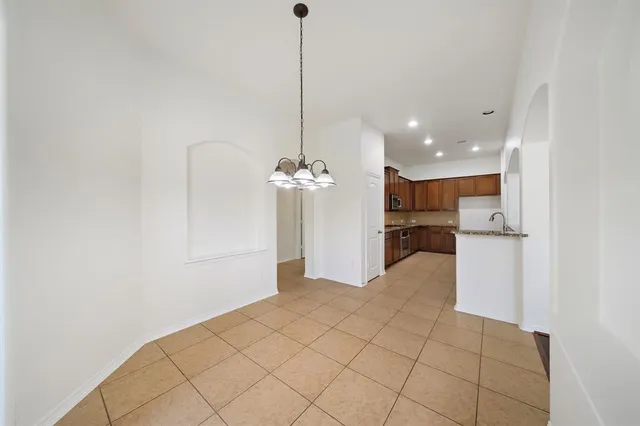 a view of a kitchen with a sink
