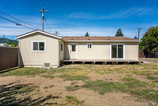 a house view with a backyard space