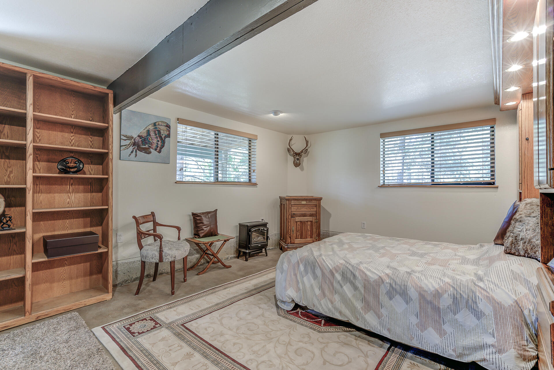551 Salt Flat Road Lewiston, CA 96052 - Photo 18 of 29 a bedroom with a bed and wooden floor