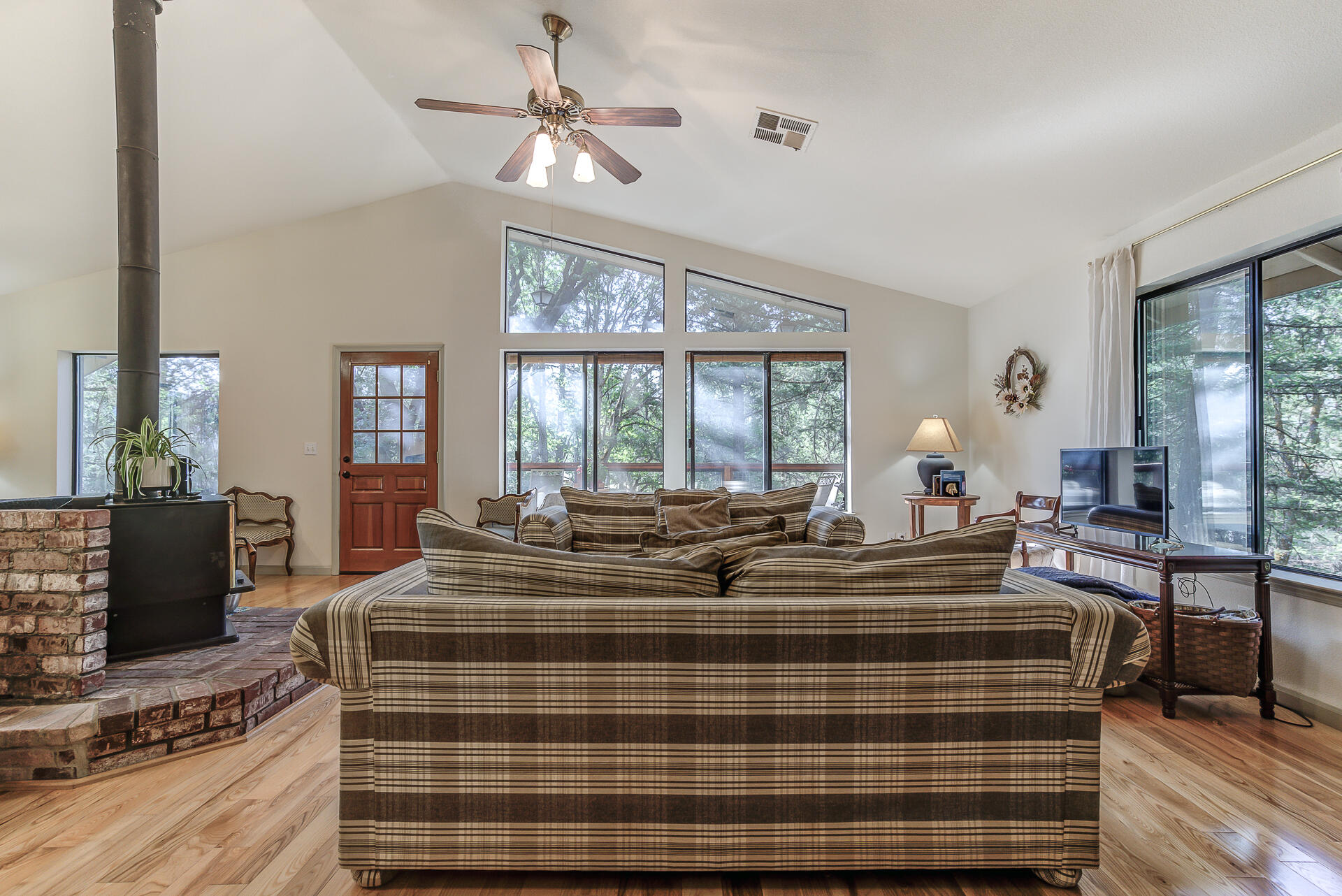 551 Salt Flat Road Lewiston, CA 96052 - Photo 4 of 29 a living room with furniture and a flat screen tv