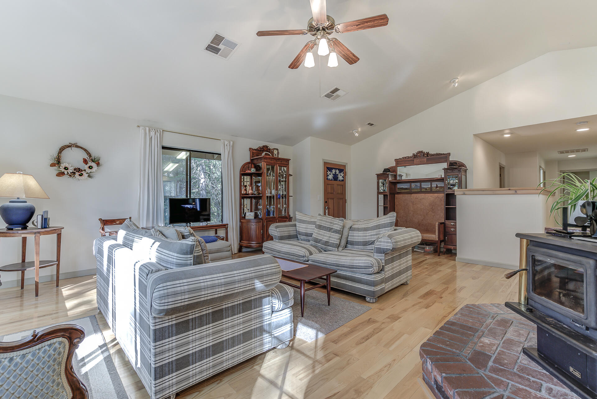 551 Salt Flat Road Lewiston, CA 96052 - Photo 5 of 29 a living room with furniture and a fireplace