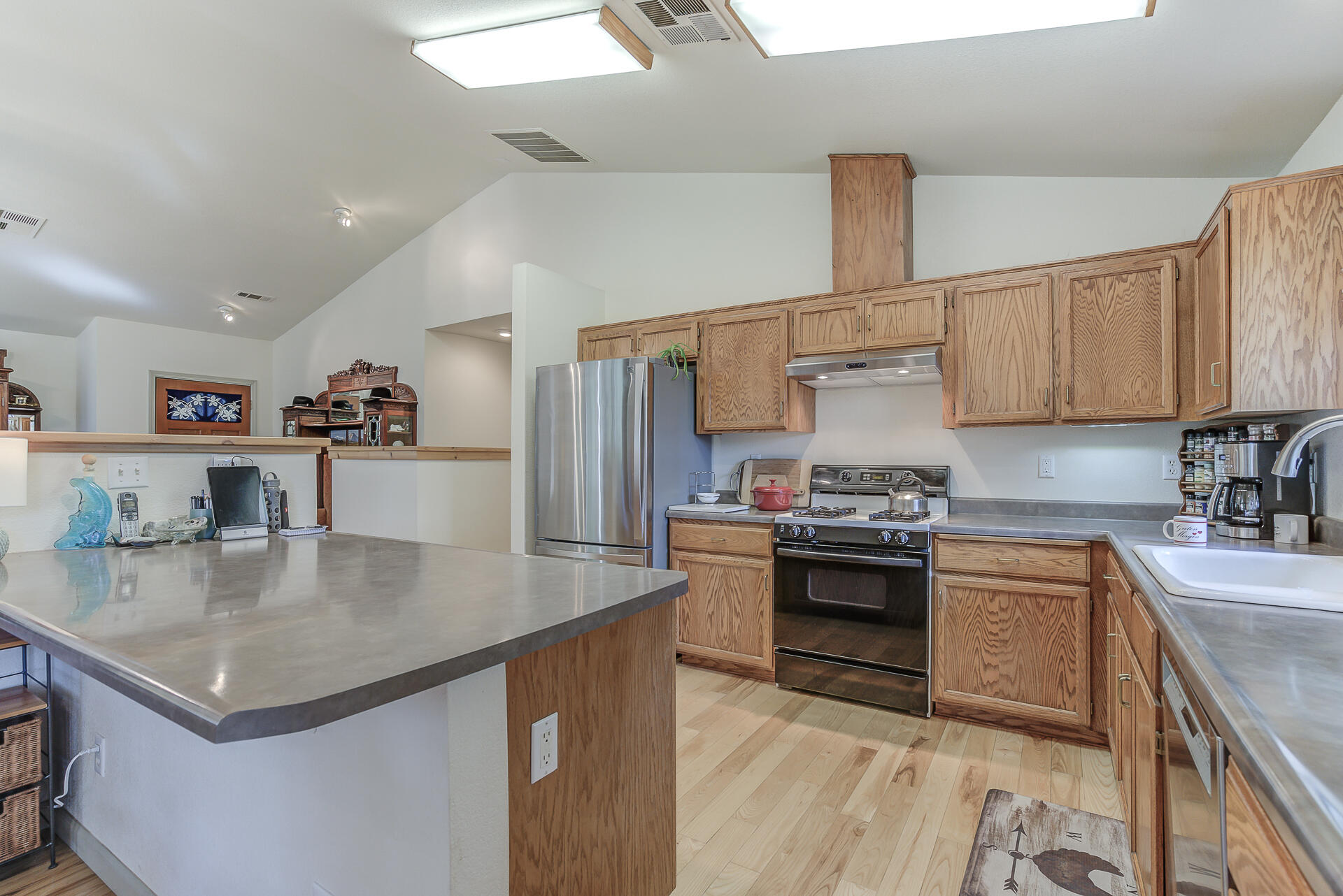 551 Salt Flat Road Lewiston, CA 96052 - Photo 7 of 29 a kitchen with stainless steel appliances granite countertop a sink dishwasher stove and refrigerator