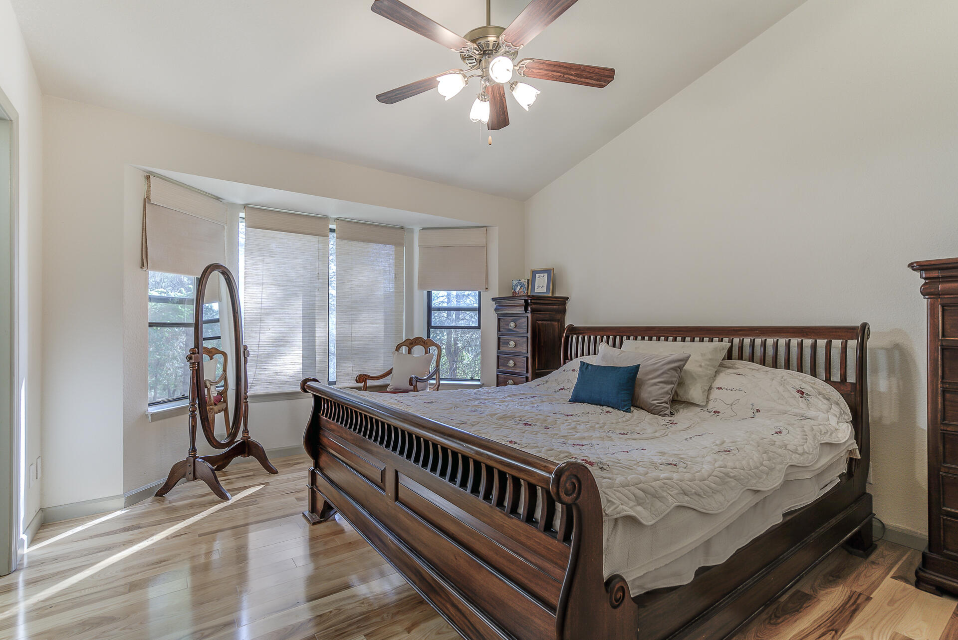 551 Salt Flat Road Lewiston, CA 96052 - Photo 10 of 29 a bedroom with bed and a chandelier