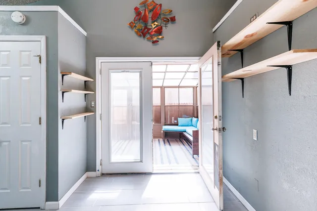 a kitchen with granite countertop a stove and a sink with granite countertops
