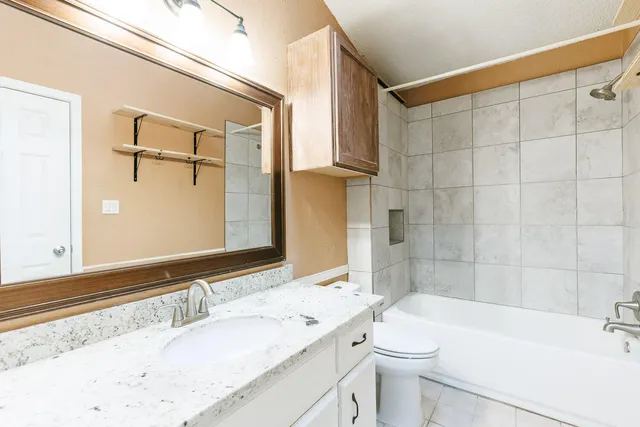 a backyard of a house with lots of green space