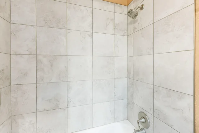 a view of a house with backyard and garden