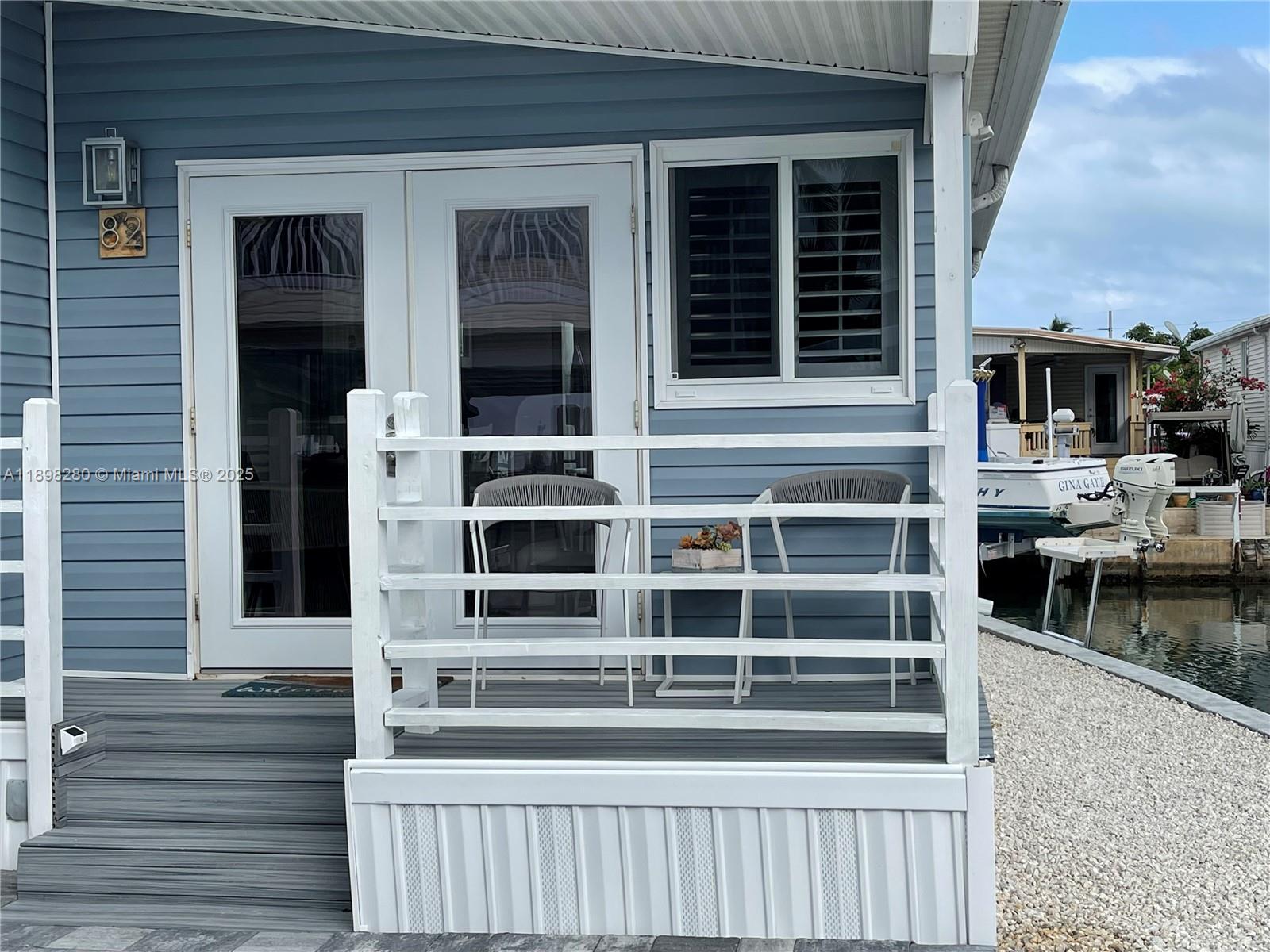65821 Overseas Highway, Unit 82 Long Key, FL 33001 - Photo 10 of 10 a view of a house with a window and balcony
