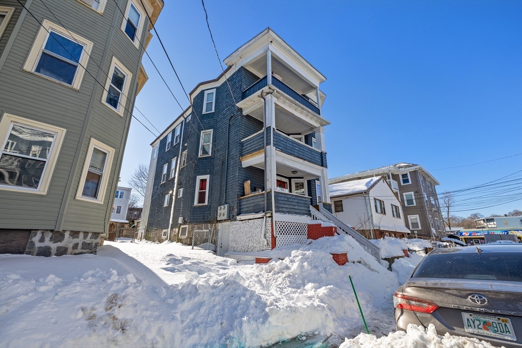 a view of a building with a road