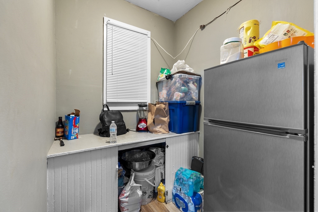 46 Theodore Street Boston, MA 02124 - Photo 16 of 24 a room with storage and utility