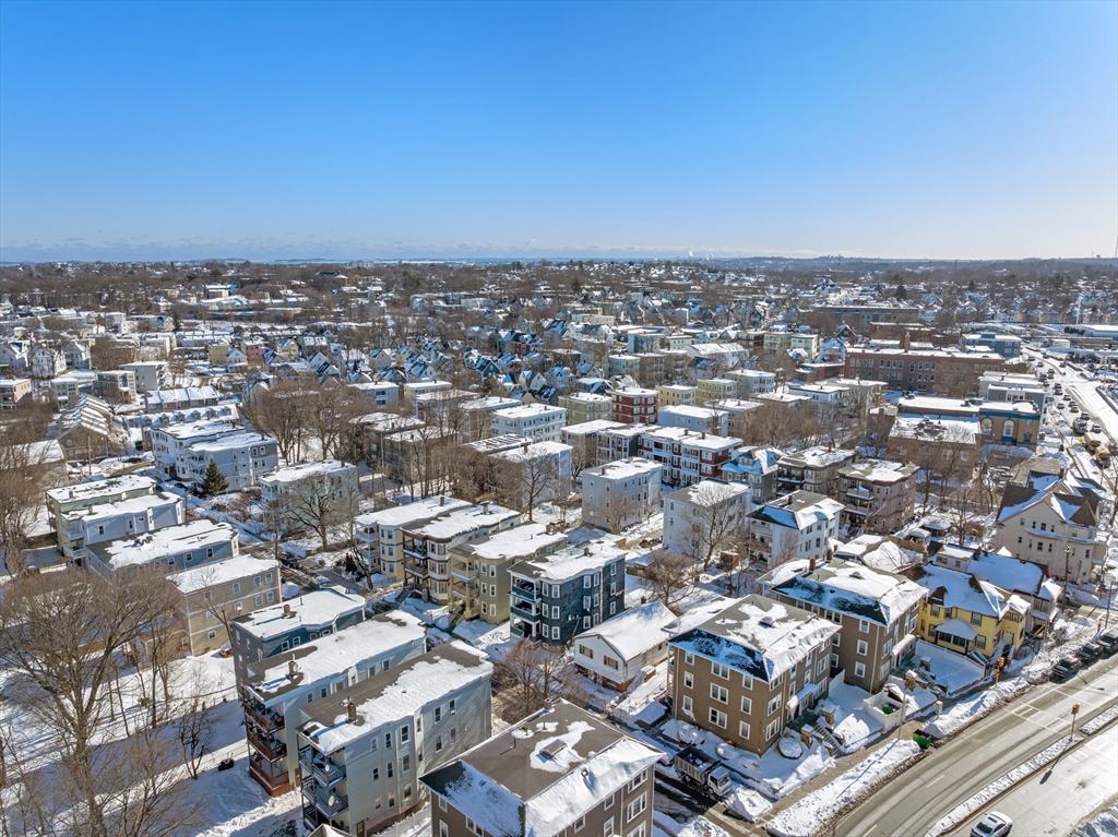 46 Theodore Street Boston, MA 02124 - Photo 21 of 24 an aerial view of a city with lots of residential buildings